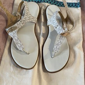 White ‘Michael Kors” sandals